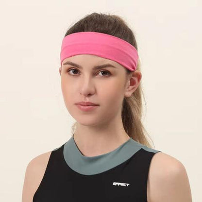 jeune femme qui fait du sport portant le bandeau cheveux rose