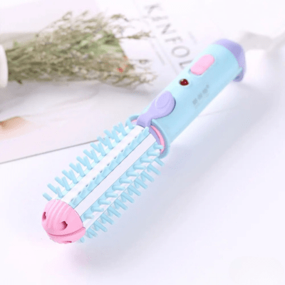 Boucleur mini easy de couleur bleu, rose et violet posé sur un plan blanc